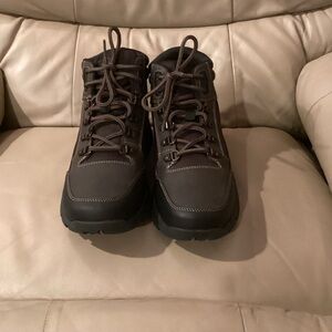 New men’s Rockport road and trail boots.